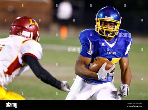 kenzie phillips football|Oxford running back Kenzie Phillips (25) tries to evade a .